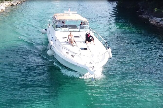 4 hours - Private 48ft Yacht all inclusive in Tulum and Playa del Carmen - Ninety minutes at a beach near the reef