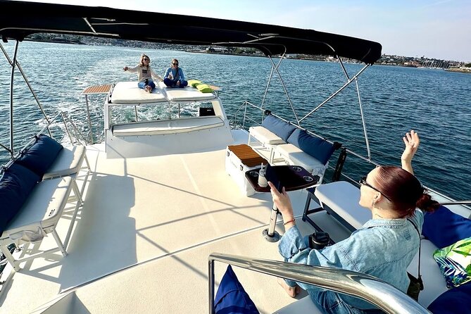 59' Paradise Party Yacht - Adventure Cruises San Diego com - Tuna Harbor and the Embracing Peace statue