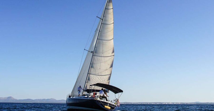 Alcudia: Sailing Yacht Excursion with Wine & Tapas - What the crew adds to the experience