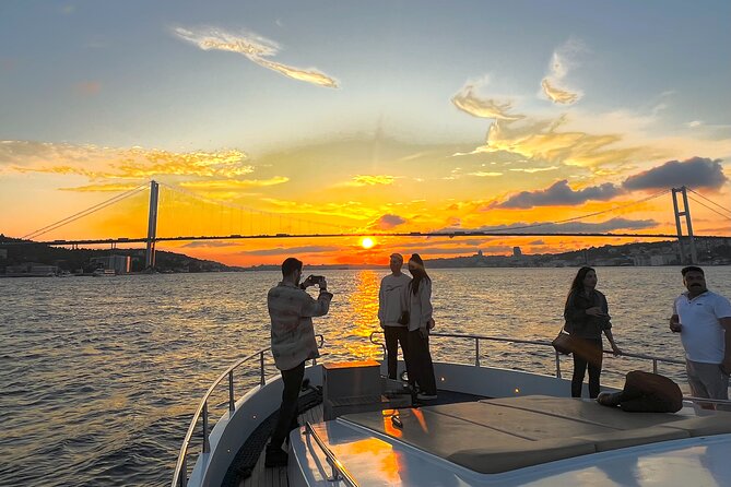 Bosphorus Sunset Yacht Cruise with Snacks and Live Guide - The first views: bridges, towers, and the two shores