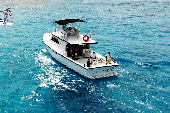 Cancun fishing charter if you don't fish you don't pay 46ft yacht 12pax 25P14 - A three-person crew helps keep the fishing moving