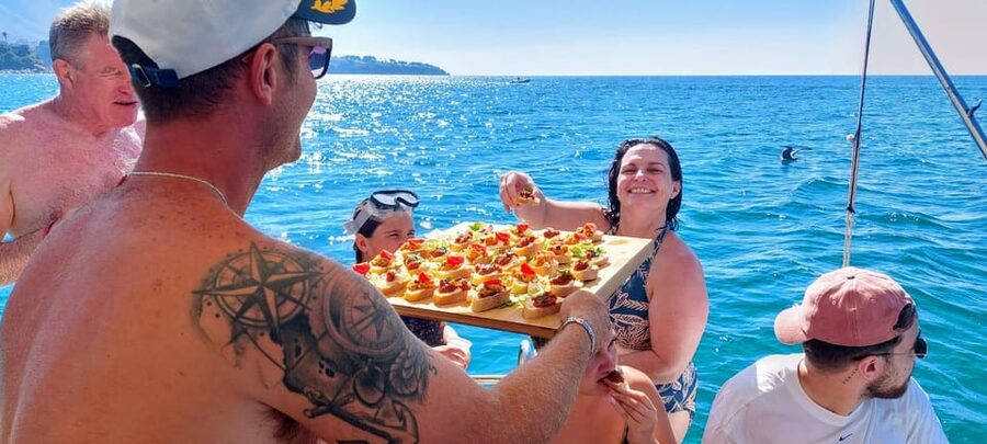 Cefalù: Mini Yacht with Snorkel Stops, Caves and Aperitif - Captain Alex and the Family Feel