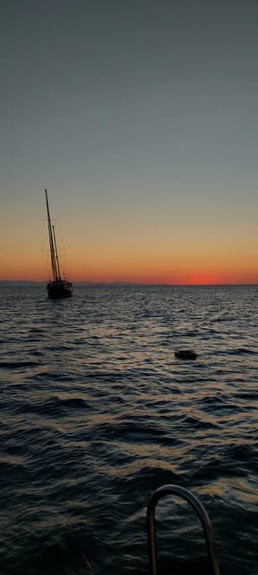Cefalù: Mini Yacht with Snorkel Stops, Caves and Aperitif - The First Cruise Past Cefalù Beach
