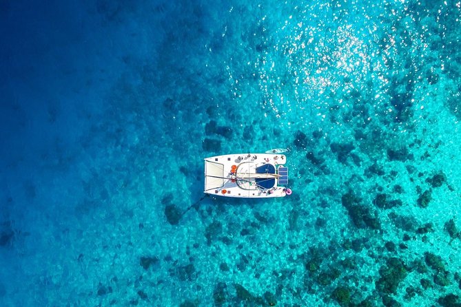 Coral Island & Sunset at Promthep cape by Catamaran Yacht - Coral Island gives you the most useful free time