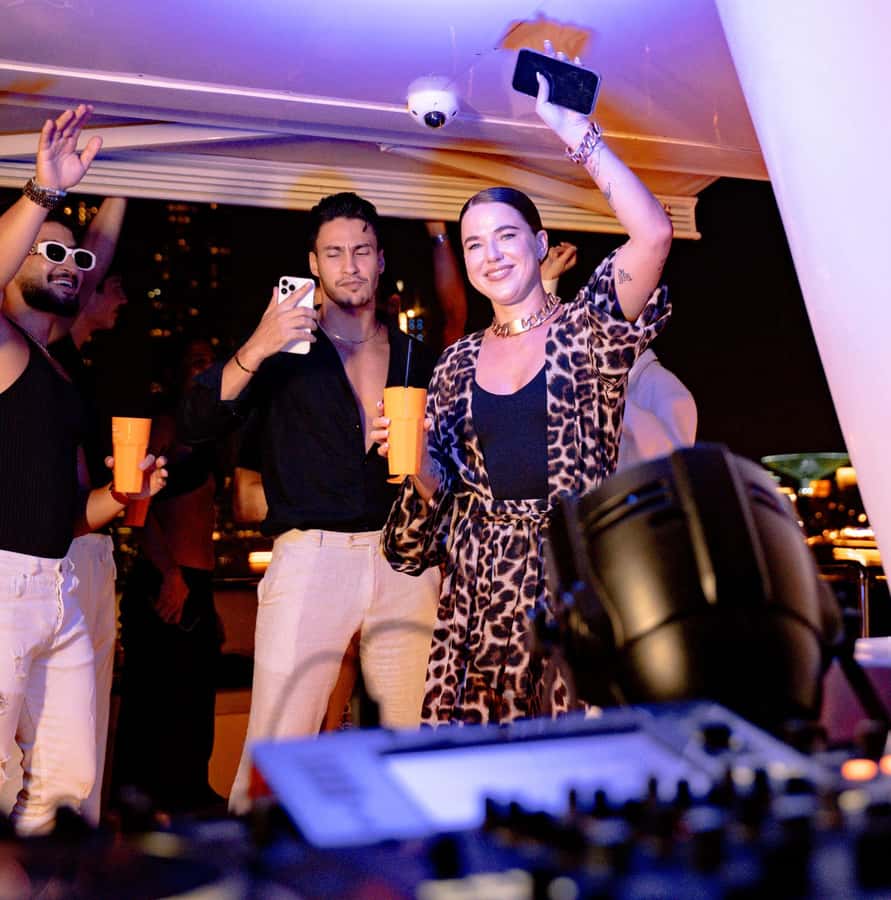Dubai: Marina Yacht Party with BBQ, Unlimited Drinks and DJ - The Marina at night: JBR and Ain Dubai