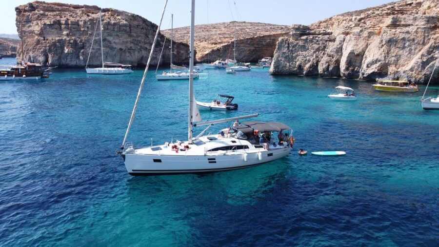 From Valletta: Full Day Private Charter on a Sailing Yacht - Crystal Lagoon for swimming and photographs