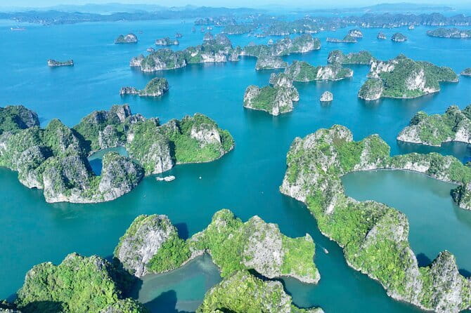 Halong Bay Day Trip Explore Caves, Kayak & Lunch by Saquila Yacht - Sailing past Bai Tho Mountain and Ha Long’s limestone islands