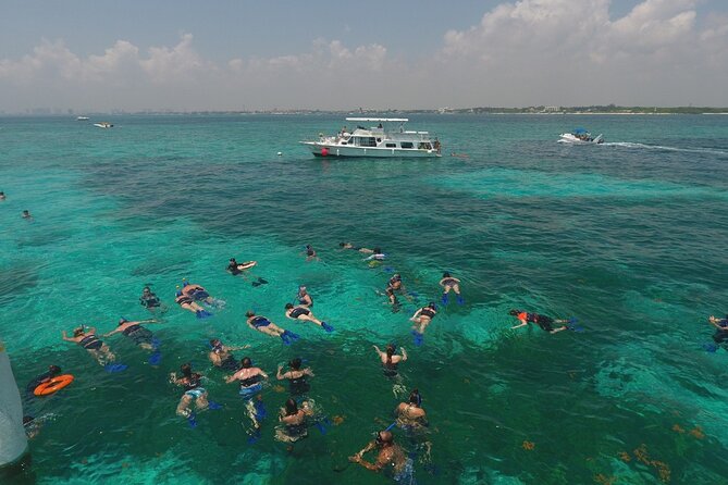 Isla Mujeres Full Day Tour on Yacht with Snorkel and Buffet - Weather, cancellation, and useful planning details