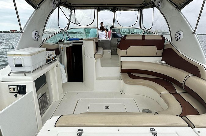 Island Fun Yacht Rental in Miami Beach - Using the floating mat and staying comfortable