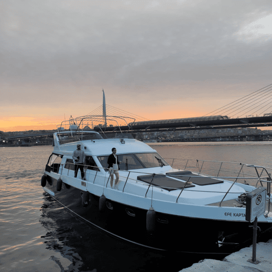 Istanbul: Bosphorus River Sunset Yacht Tour with Commentary - Ortaköy Mosque beneath the bridge