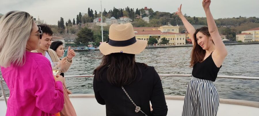 Istanbul: Bosphorus Sunset Cruise on Yacht with Live Guide - Under the first bridge and toward Rumeli Fortress