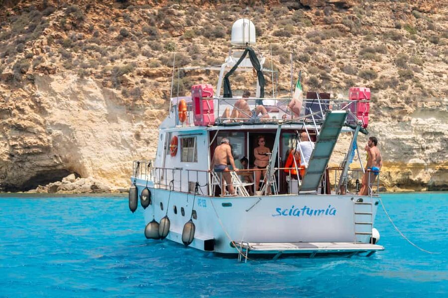 Lampedusa: Yacht excursion, swimming stops and typical lunch - Tabaccara Bay and the value of an early start