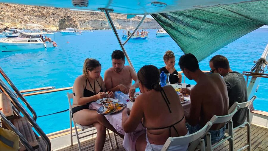 Lampedusa: Yacht excursion, swimming stops and typical lunch - Cala Pulcino and coves reached from the water