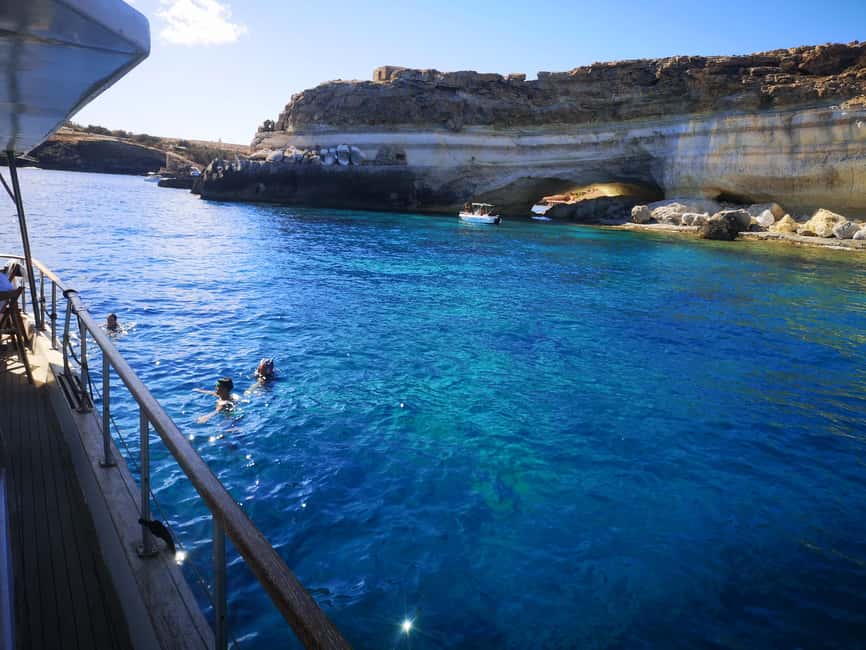 Lampedusa: Yacht excursion, swimming stops and typical lunch - Capo Ponente and the old submerged ship
