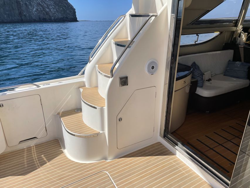 Las Galletas: Private Luxury Yacht Cruise with Lunch - The cliffs and caves near Los Cristianos