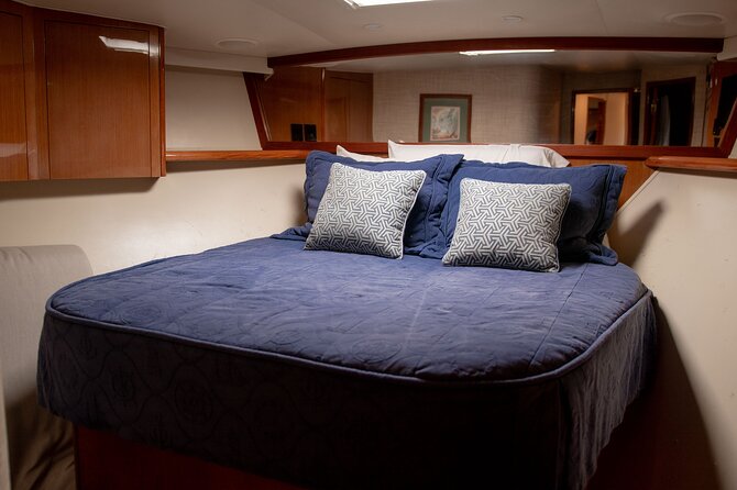 Les Is More 68ft Viking Fishing Yacht Rental - A calm bay, swimming, and water toys
