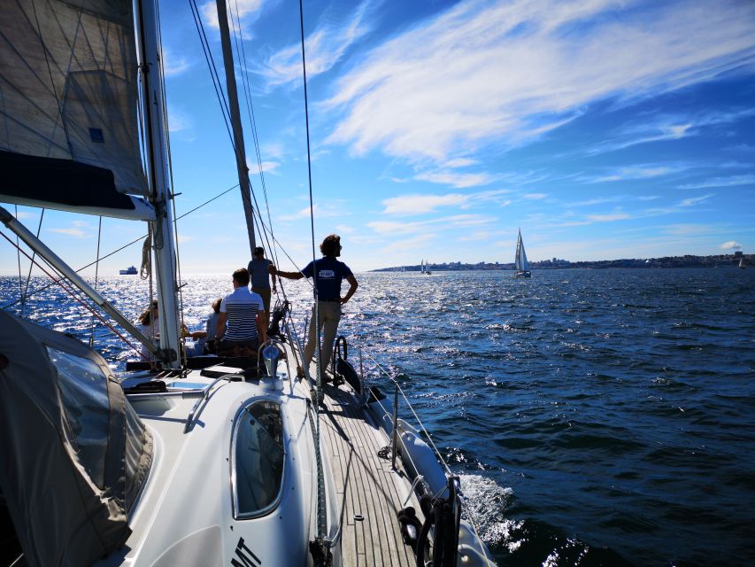 Lisbon: 2-Hour Sailing Yacht Cruise & Guided Tour w/2 drinks - Belém Tower and the 25 de Abril Bridge