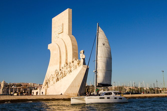 Lisbon: Sunset Cruise With Drinks on Spacious Yacht - Christ the King and the riverside monuments