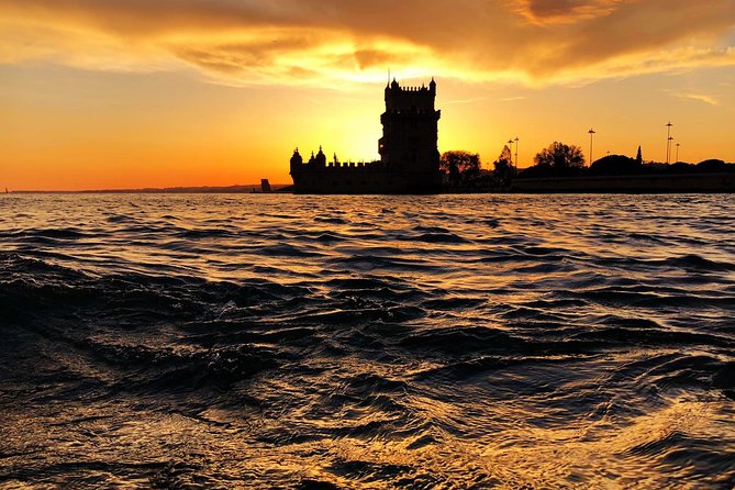 Lisbon: Sunset Cruise With Drinks on Spacious Yacht - Sunset beneath the 25 de Abril Bridge