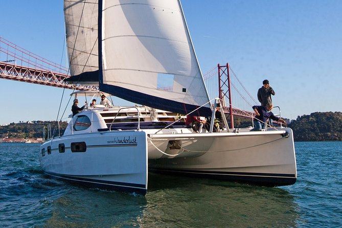 Lisbon: Sunset Cruise With Drinks on Spacious Yacht - Drinks, seating, and the small-group feel