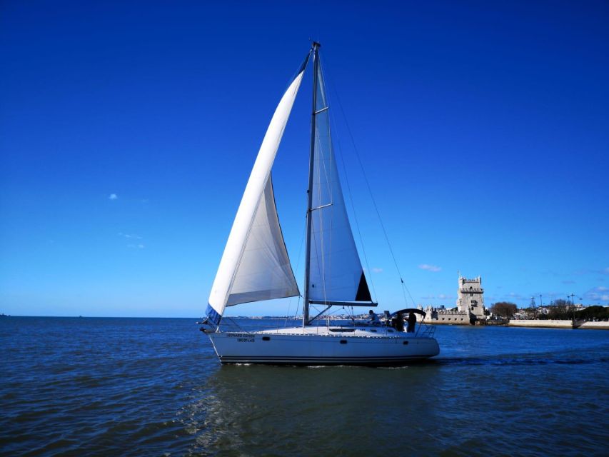 Lisbon: Yacht Sailing Tour With Portuguese Wine and History - Praça do Comércio and Baixa from the river