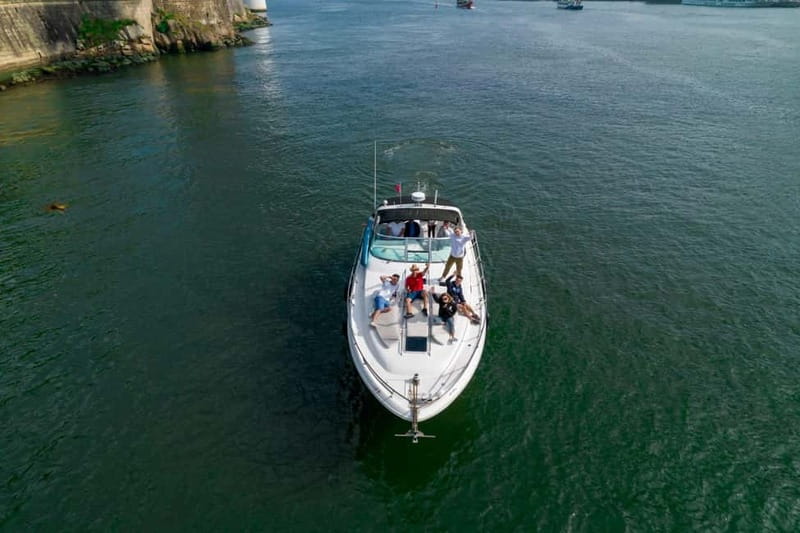 Luxury Douro Yacht Tour: Scenic Views & Complimentary Drinks - A drink, simple snacks, and a relaxed onboard setting