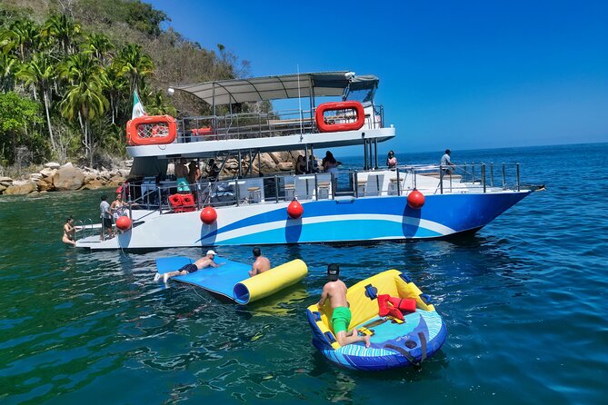 Mega Catamarans ALL INCLUSIVE Remote Paradise Beach Adventure - The return ride: dancing, wildlife, and a final drink