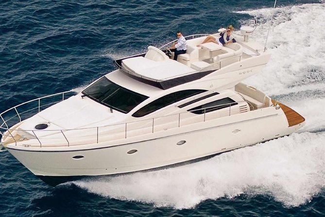 Midningtsun - Luxury Yacht Arctic Queen - Mountains, islands, and Tromsø from the water
