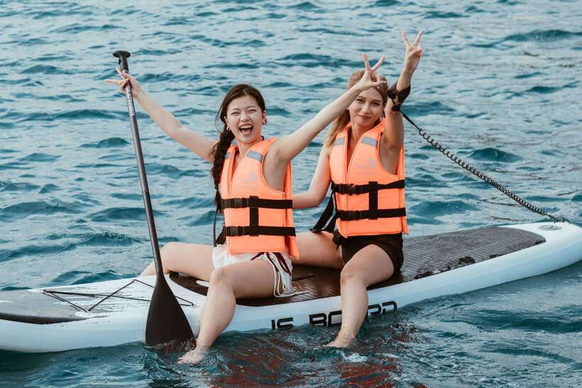 Nha Trang: VIP YACHT TOUR ( BBQ, Water activities) - Swimming, snorkeling, SUP, and the yacht slide