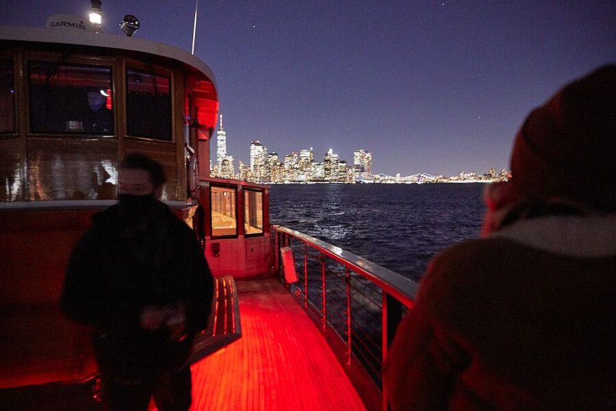 NYC: City Lights Yacht Cruise with Drink Included - Boarding at Chelsea Piers and settling into the yacht