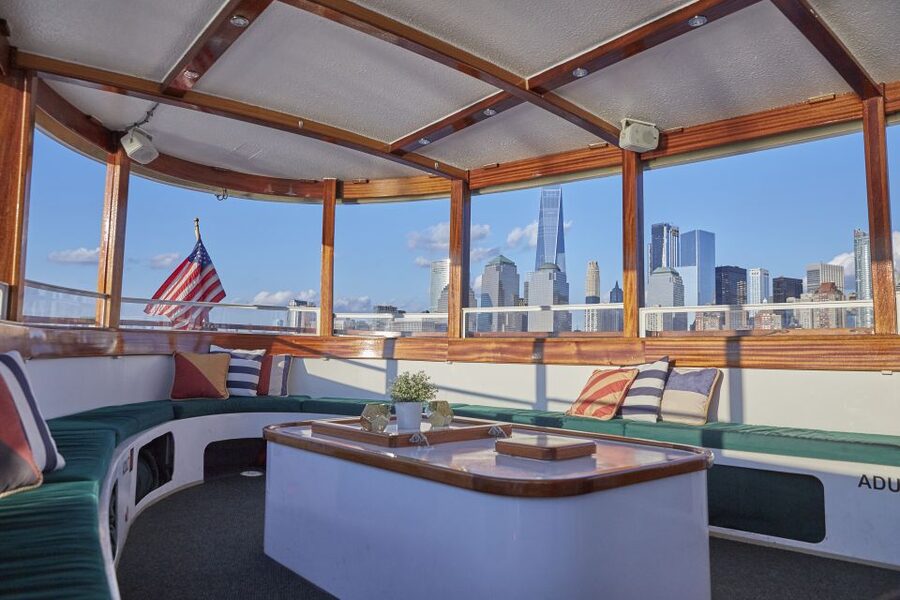 NYC: Sunset Cruise on a Small Yacht with a Drink - Lower Manhattan at sunset