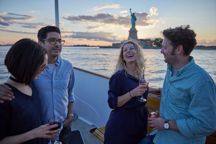 NYC: Sunset Cruise on a Small Yacht with a Drink - The open bow and the glassed-in cabin