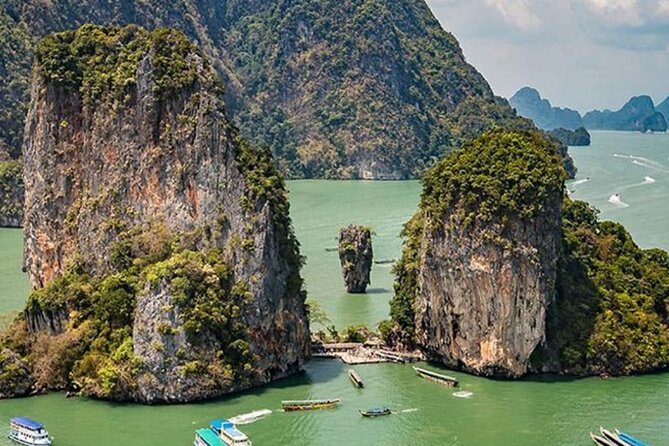 Phuket: James Bond Island & Phang Nga Bay Sunset Luxury Yacht - Water slide and paddleboarding at Naka Island