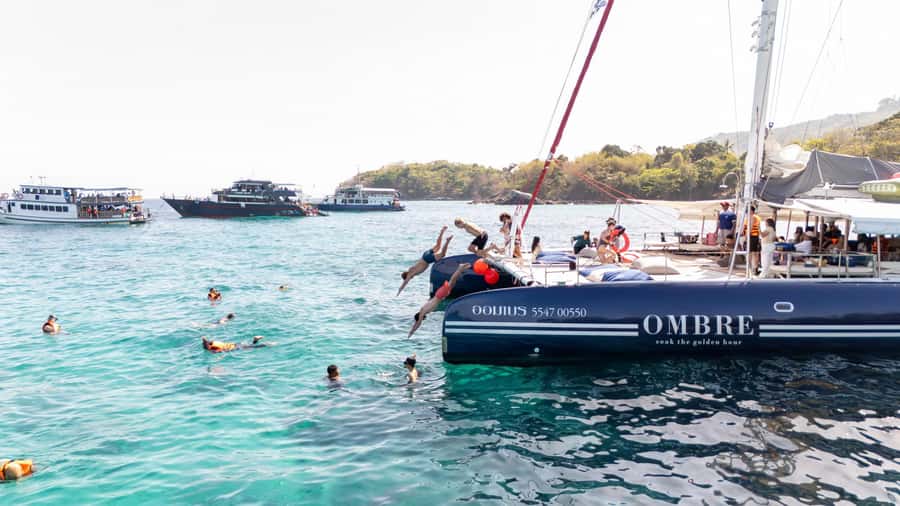 Phuket: Racha & Coral Island Day Trip by OMBRE Yacht - Promthep Cape at sunset