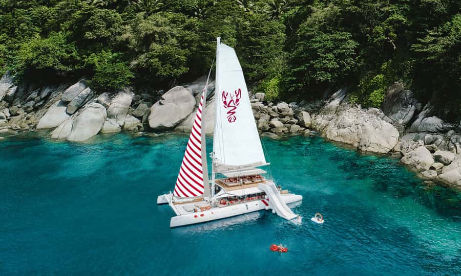 Phuket: Sailing Yacht Island Hopping & Party Full-Day Cruise - Racha Yai brings the water activities