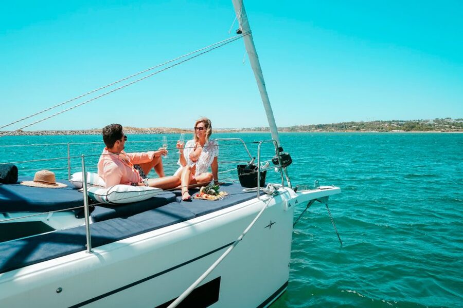 Portimao: Half-Day Sailing Yacht Cruise to the Benagil Caves - Swimming Stops and Two Included Paddleboards