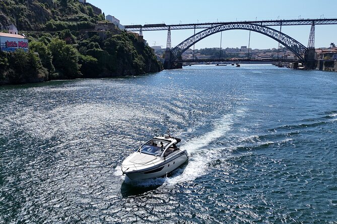 Porto: Private Yacht Experience with Local Wines & Snacks - Under Arrábida Bridge and toward the Atlantic