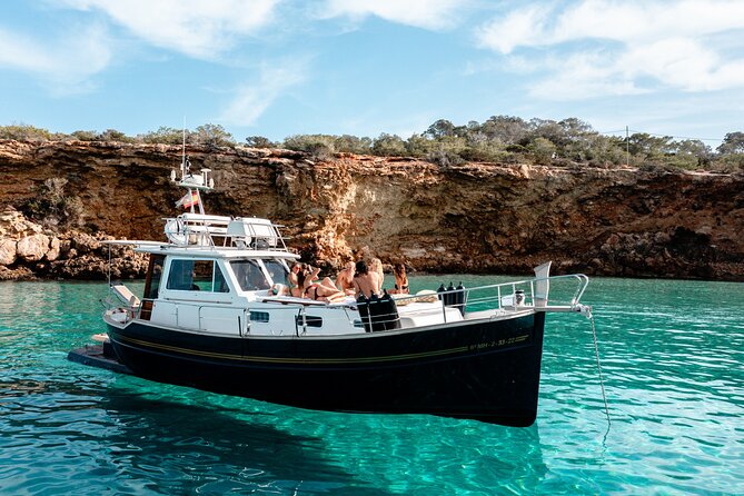 Private Full Day boat charter in Traditional Balearic Yacht - Swimming, snorkeling, and paddleboarding