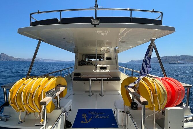 Private Full-Day Motor Yacht Cruise with Meal, Open Bar+Transfers - Sailing past Ammoudi Harbour and Oia