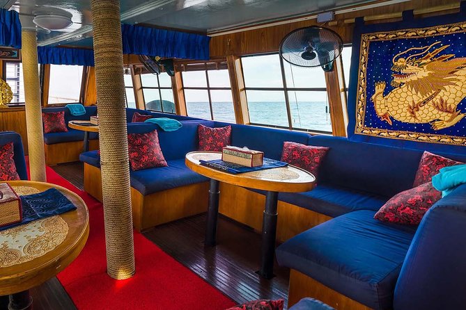 Private Full-Day Red Dragon Yacht for Snorkeling Koh Tan & Visit Pink Dolphin - Koh Tan snorkeling, floating, and the onboard jacuzzi