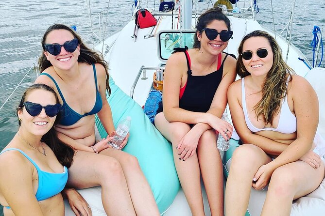 Private Luxury Yacht Charters, BYOB & Dolphins - Dolphins, sailboat races, and harbor life
