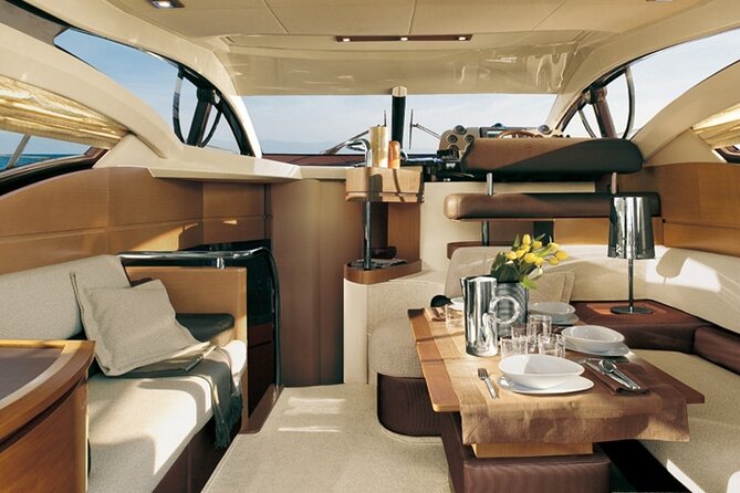 Private Motor Yacht Cruise with BBQ, Open Bar & Transfers - The afternoon cruise ends with Oia at sunset
