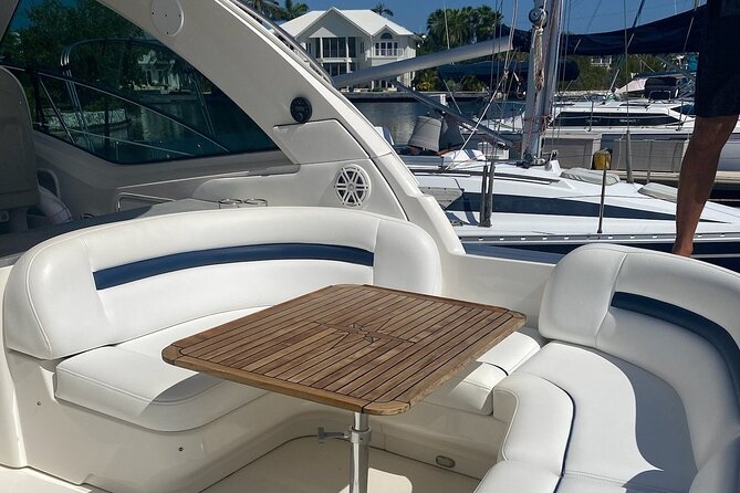 Private Yacht 48 ft Sting Ray City, Snorkel & Starfish Beach - Snorkeling over coral in shallow water