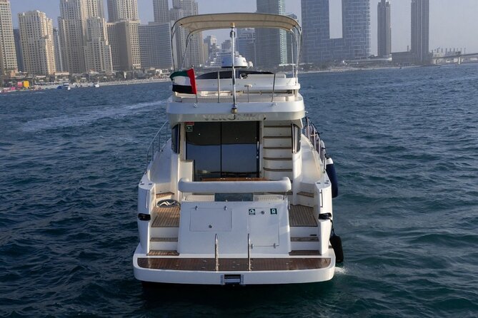 Private Yacht Cruising Rental from Dubai Marina - A yacht built for shade, music, and family time