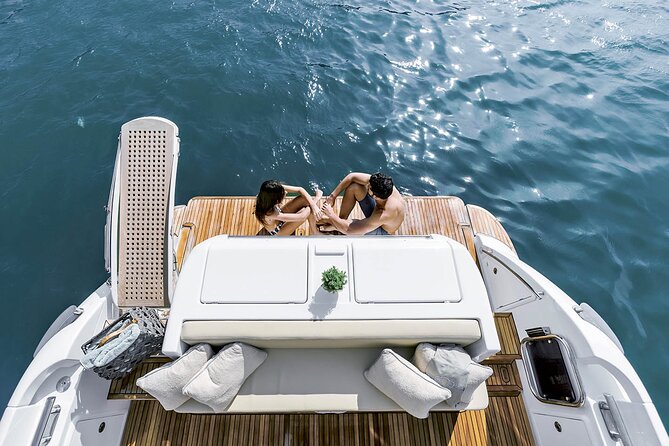 Santorini Caldera: Private Flybridge Yacht Experience - Pickup, weather, and the practical rules