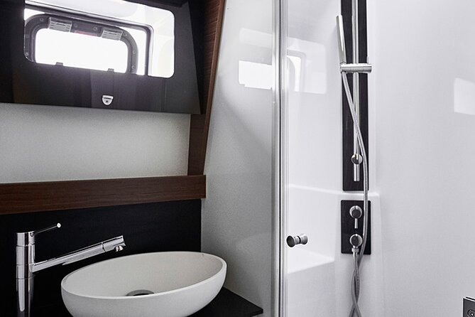 Santorini Private Tour Half-Day Sailing Platinum Catamaran Cruise - Aspronisi and the volcanic heart of the caldera