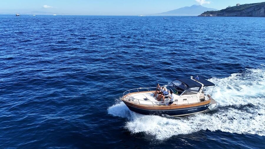 Sorrento: Capri and Blue Grotto Yacht Tour with Snorkeling - Faraglioni, Natural Arch, and the island’s famous profile