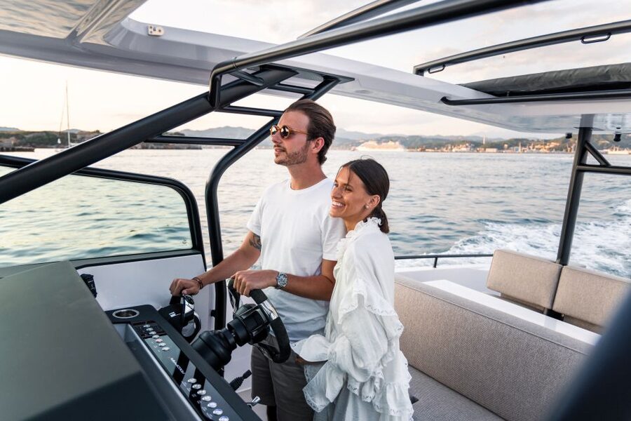 The Fastest All Inclusive Private Motor Yacht in Santorini - Oia from below the cliffs