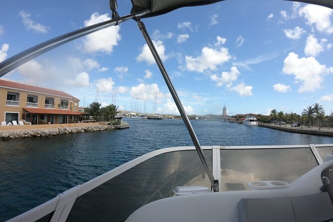 Yacht tour with local guide & snorkeling activities - Reaching Klein Bonaire by dinghy and boat
